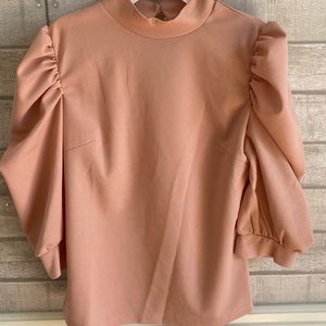 Pink puffy sleeve shirt